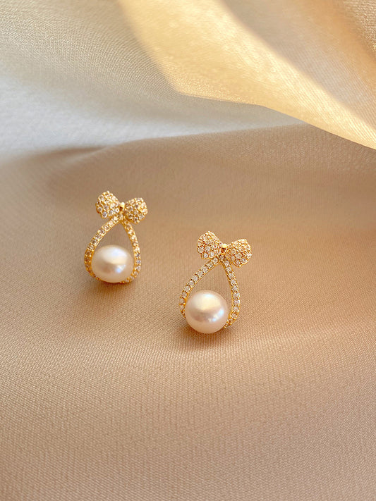 Boucles d'Oreilles Kenza Nœud Pavé de Perles