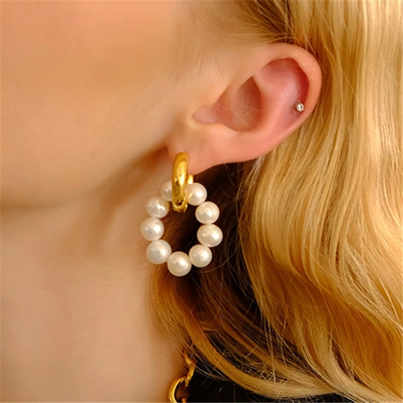 Boucles d'oreilles pendantes asymétriques en perles